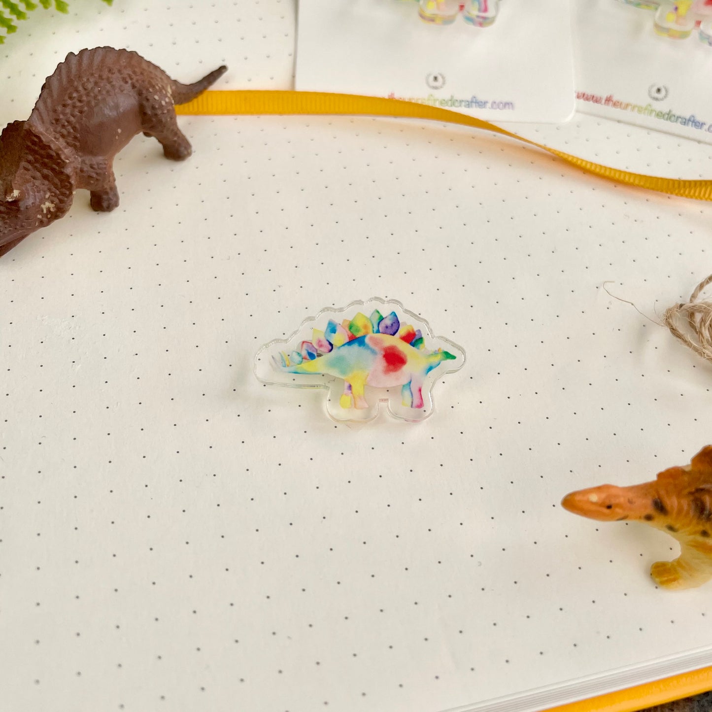 Rainbow Stegosaurus Acrylic Pin