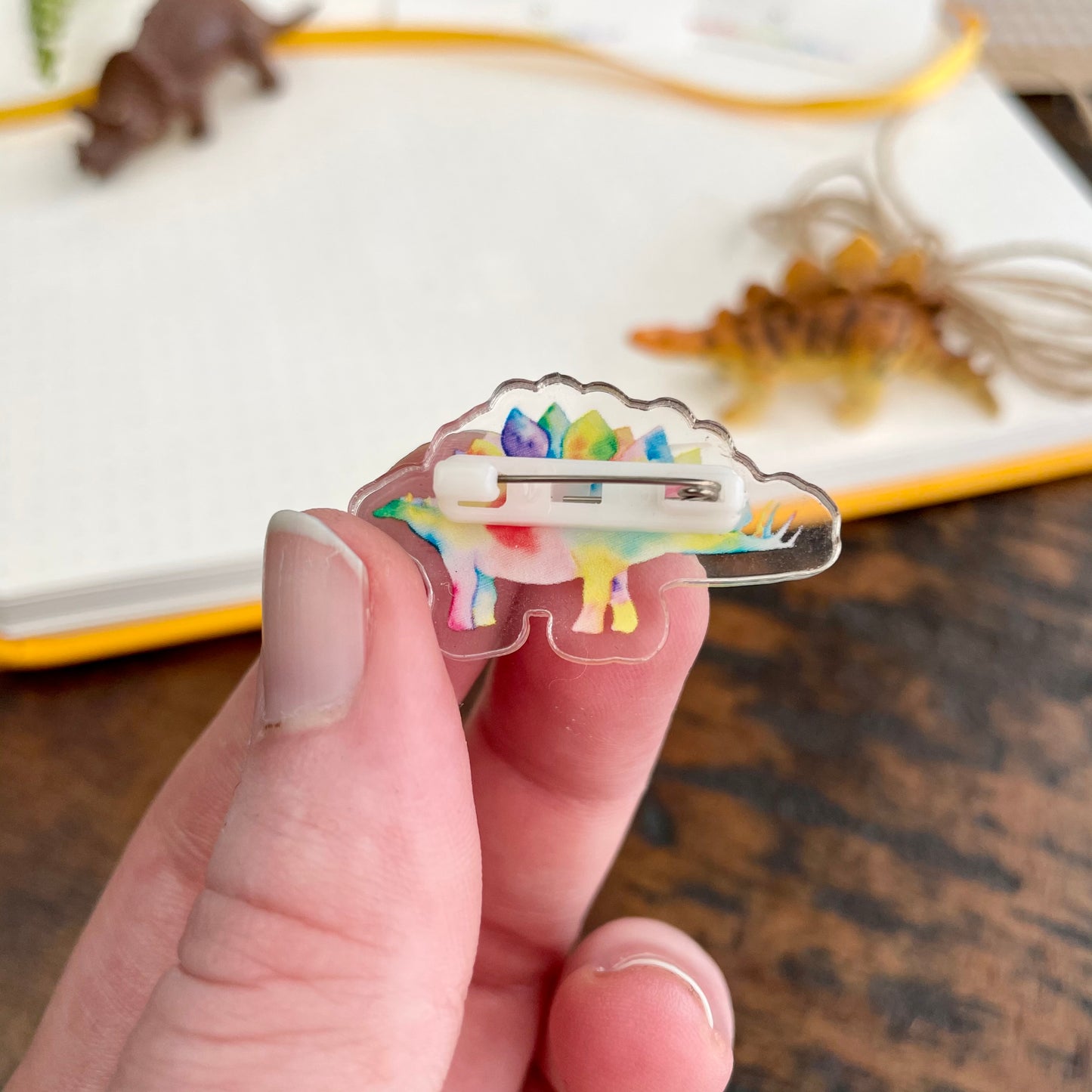 Rainbow Stegosaurus Acrylic Pin